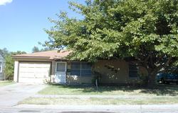 4629 South Bonham Street Amarillo, TX 79110 - Photo 1 of 1 a view of a house with a yard