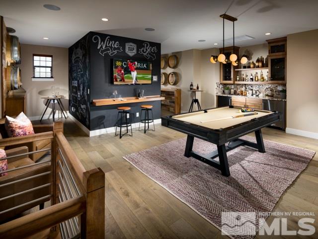 9520 Baldacci Court, Unit HOMESITE 33 Reno, NV 89521 - Photo 6 of 10 a living room with furniture and a flat screen tv