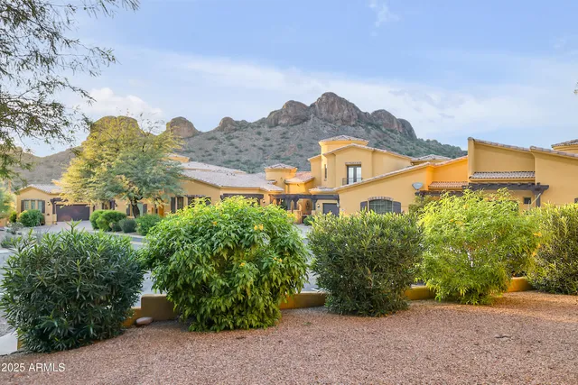 a view of a building with a garden