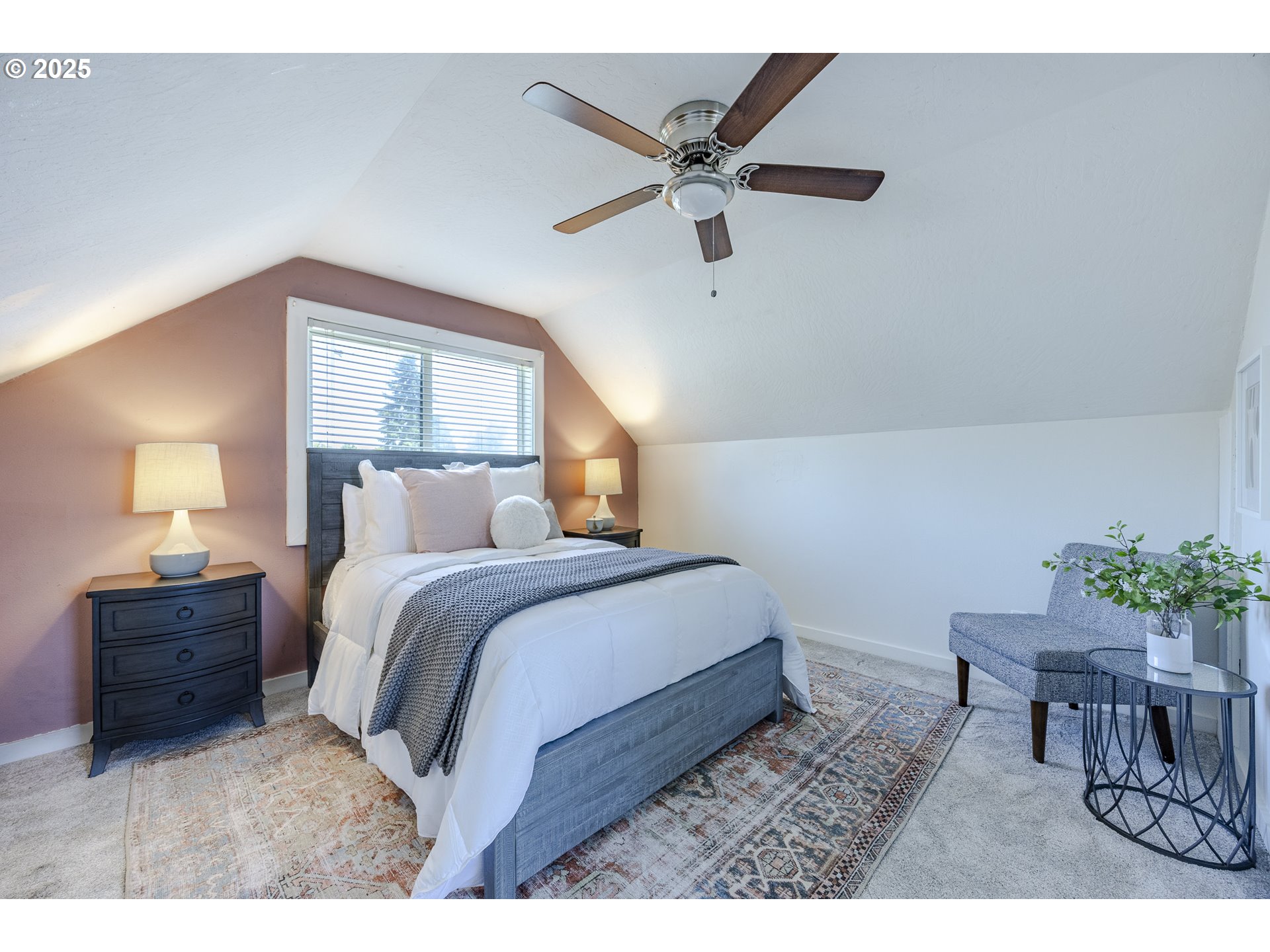 397 South 32nd Street Springfield, OR 97478 - Photo 12 of 30 a bedroom with a bed window and a chair