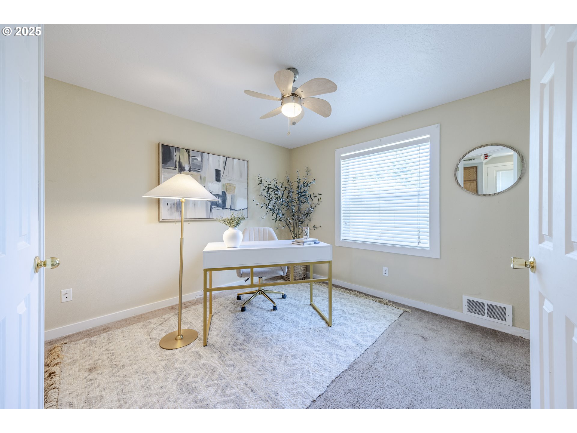 397 South 32nd Street Springfield, OR 97478 - Photo 7 of 30 a dining room with wooden floor a chandelier and windows