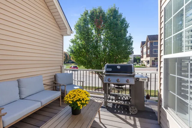 a view of a deck with furniture