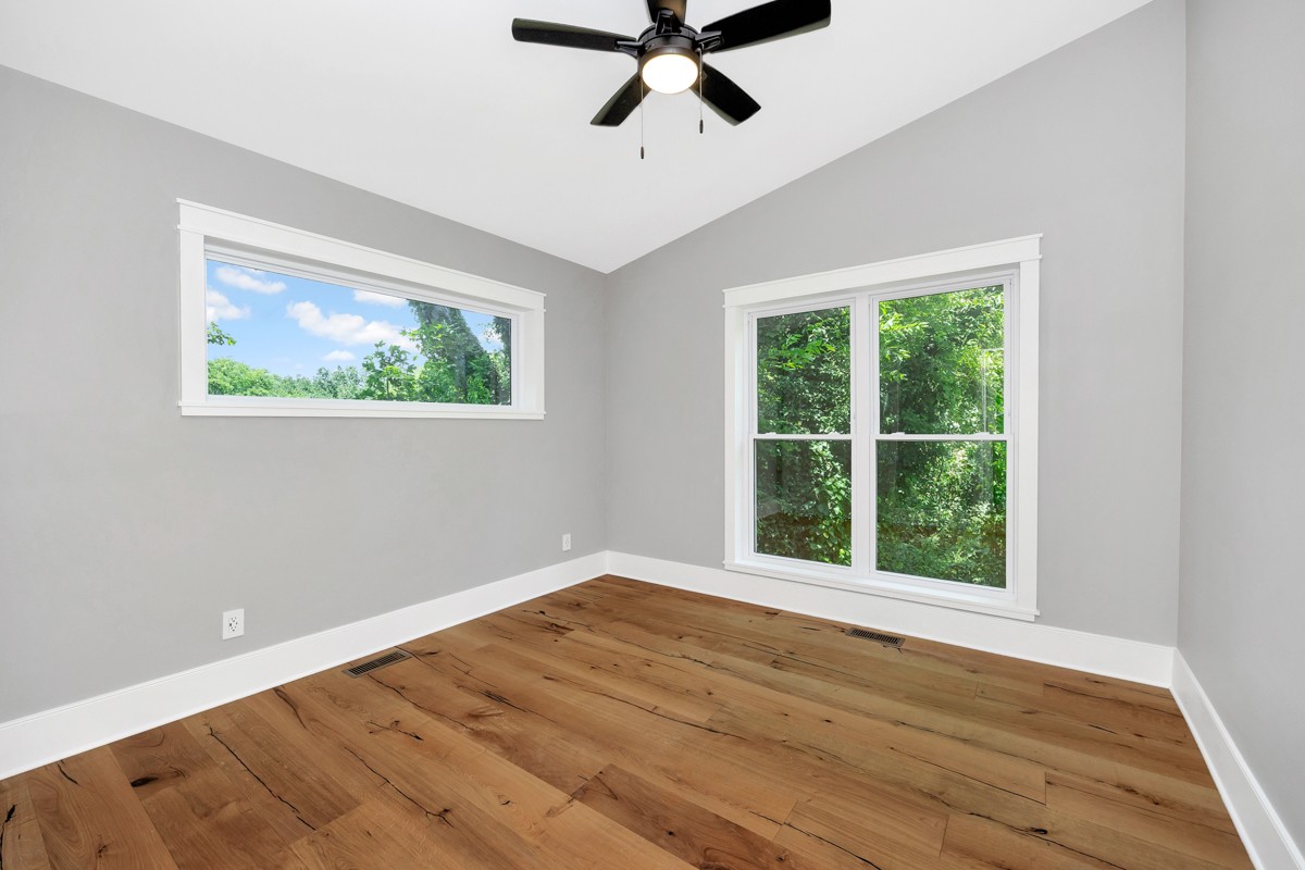 320 Park Street Pulaski, TN 38478 - Photo 13 of 46 a view of an empty room with wooden floor and a window