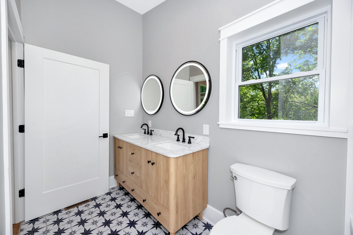 320 Park Street Pulaski, TN 38478 - Photo 14 of 46 a bathroom with a sink a toilet and a window