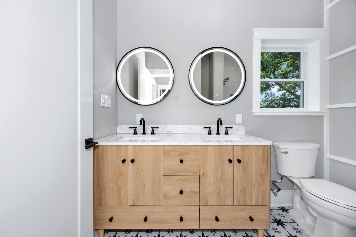 320 Park Street Pulaski, TN 38478 - Photo 15 of 46 a bathroom with a double vanity sink and a mirror
