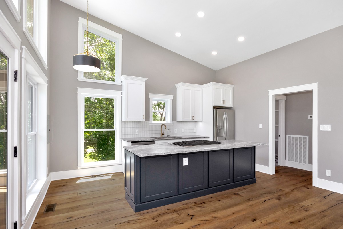 320 Park Street Pulaski, TN 38478 - Photo 20 of 46 a kitchen with a sink cabinets and wooden floor