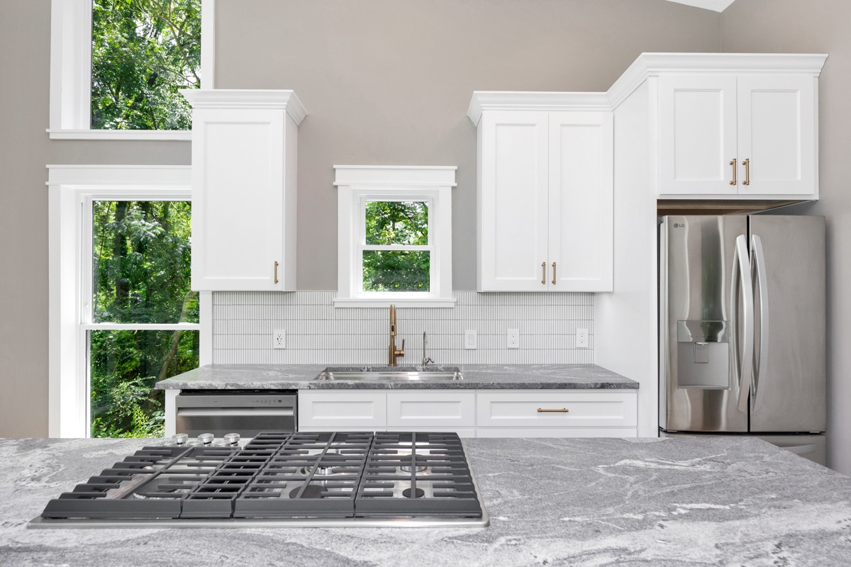 320 Park Street Pulaski, TN 38478 - Photo 25 of 46 a kitchen with sink refrigerator and window