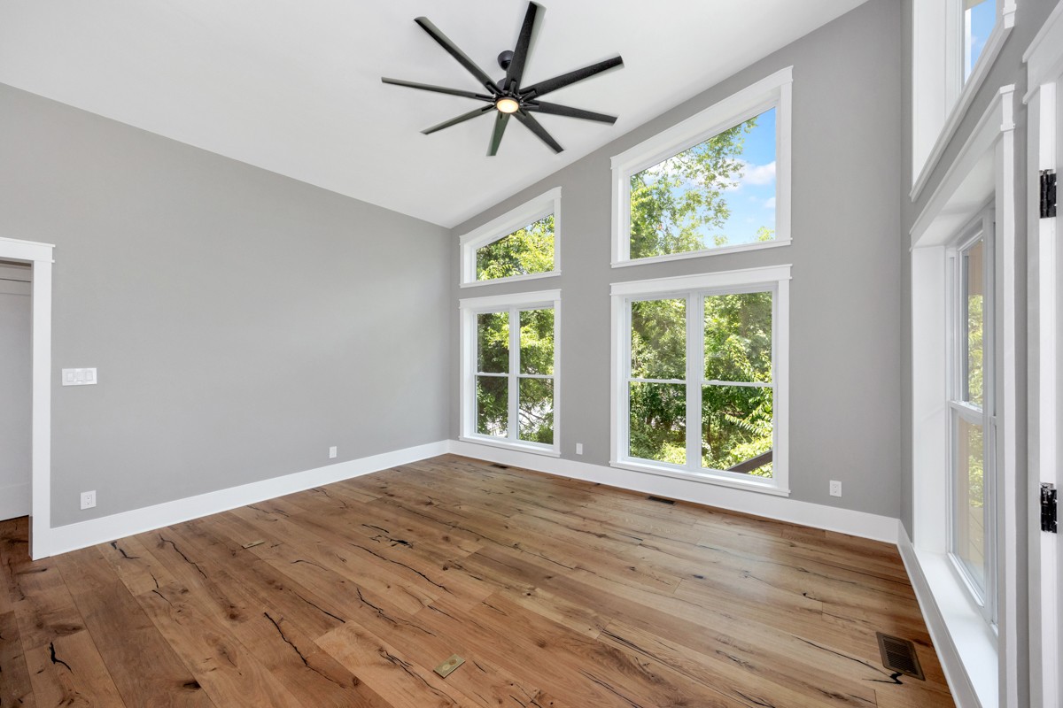 320 Park Street Pulaski, TN 38478 - Photo 26 of 46 a view of an empty room with a window and wooden floor