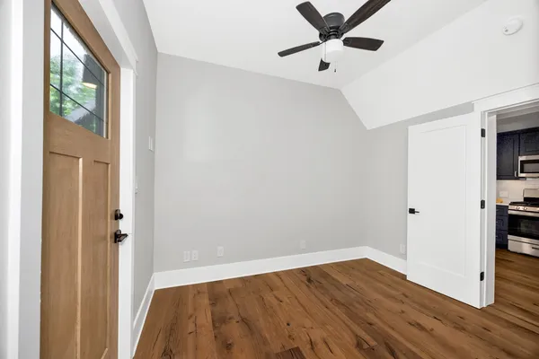 a bathroom with a sink vanity and mirror