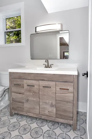 a view of balcony with wooden floor and fence
