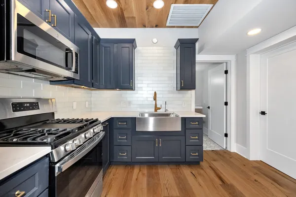 a very nice looking room with a large kitchen