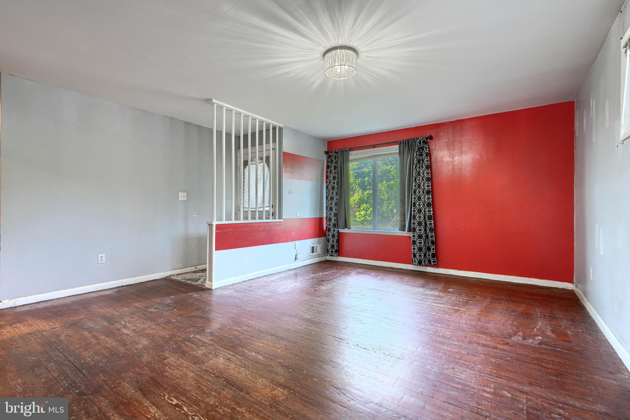 9706 Liberty Road Randallstown, MD 21133 - Photo 10 of 43 a view of an empty room with a window