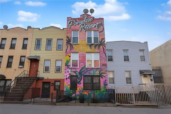 a front view of multi story residential apartment building