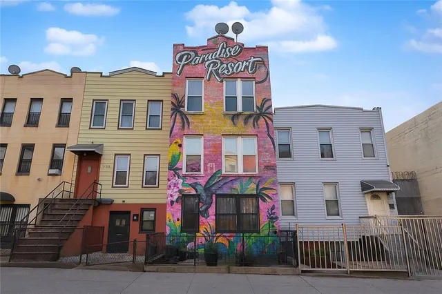 a front view of multi story residential apartment building