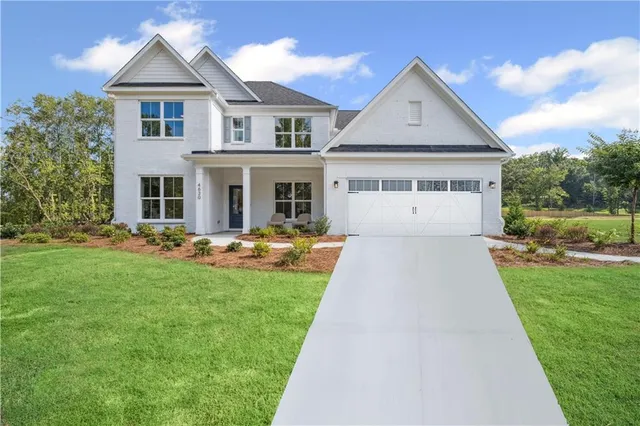 a view of house with garden