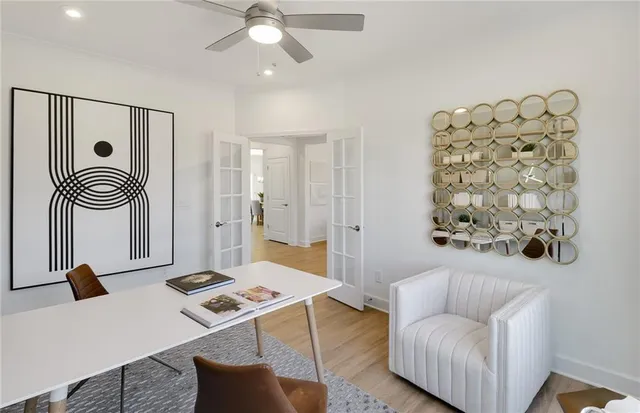 a living room with furniture and a rug