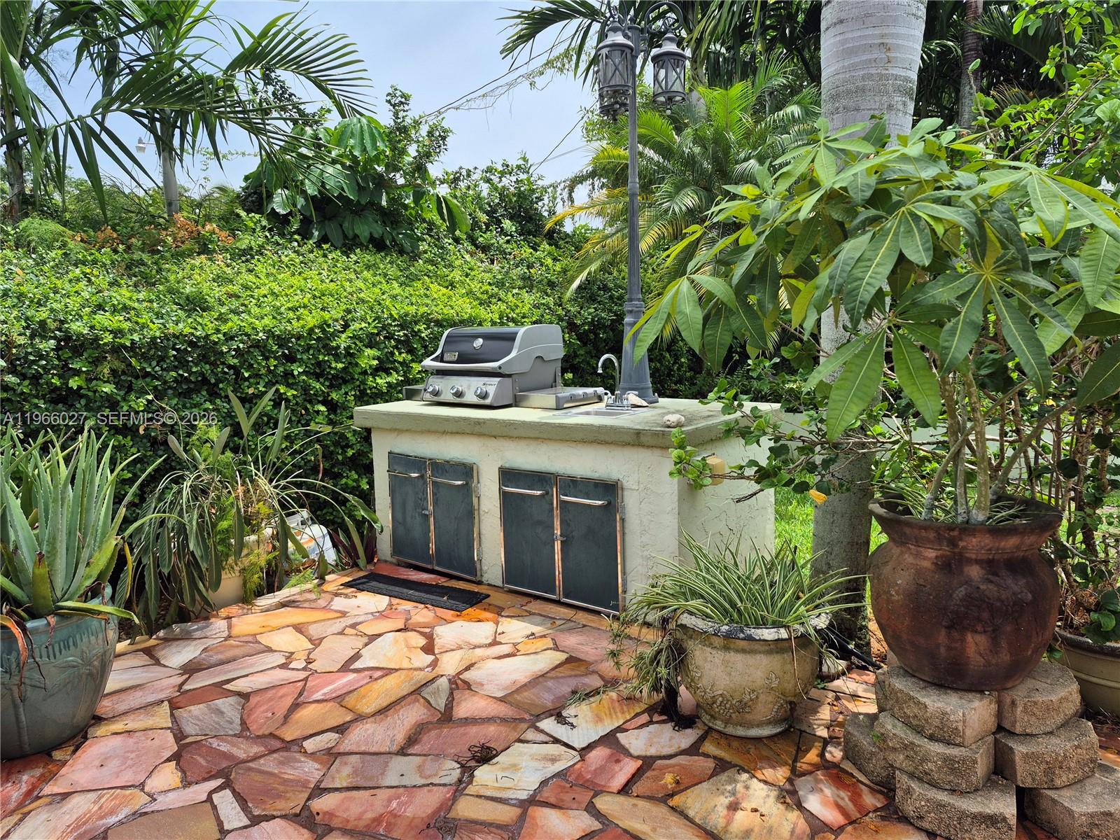 16721 Southwest 298th Terrace Homestead, FL 33030 - Photo 15 of 19 a view of a house with a yard and sitting area