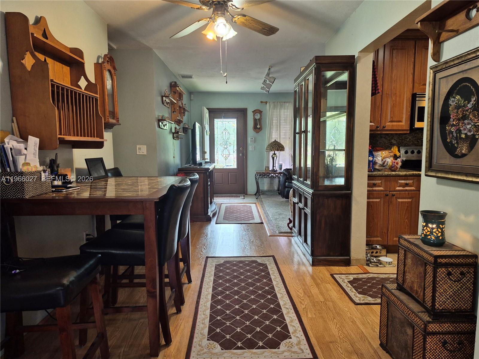 16721 Southwest 298th Terrace Homestead, FL 33030 - Photo 3 of 19 a view of a dining room with furniture