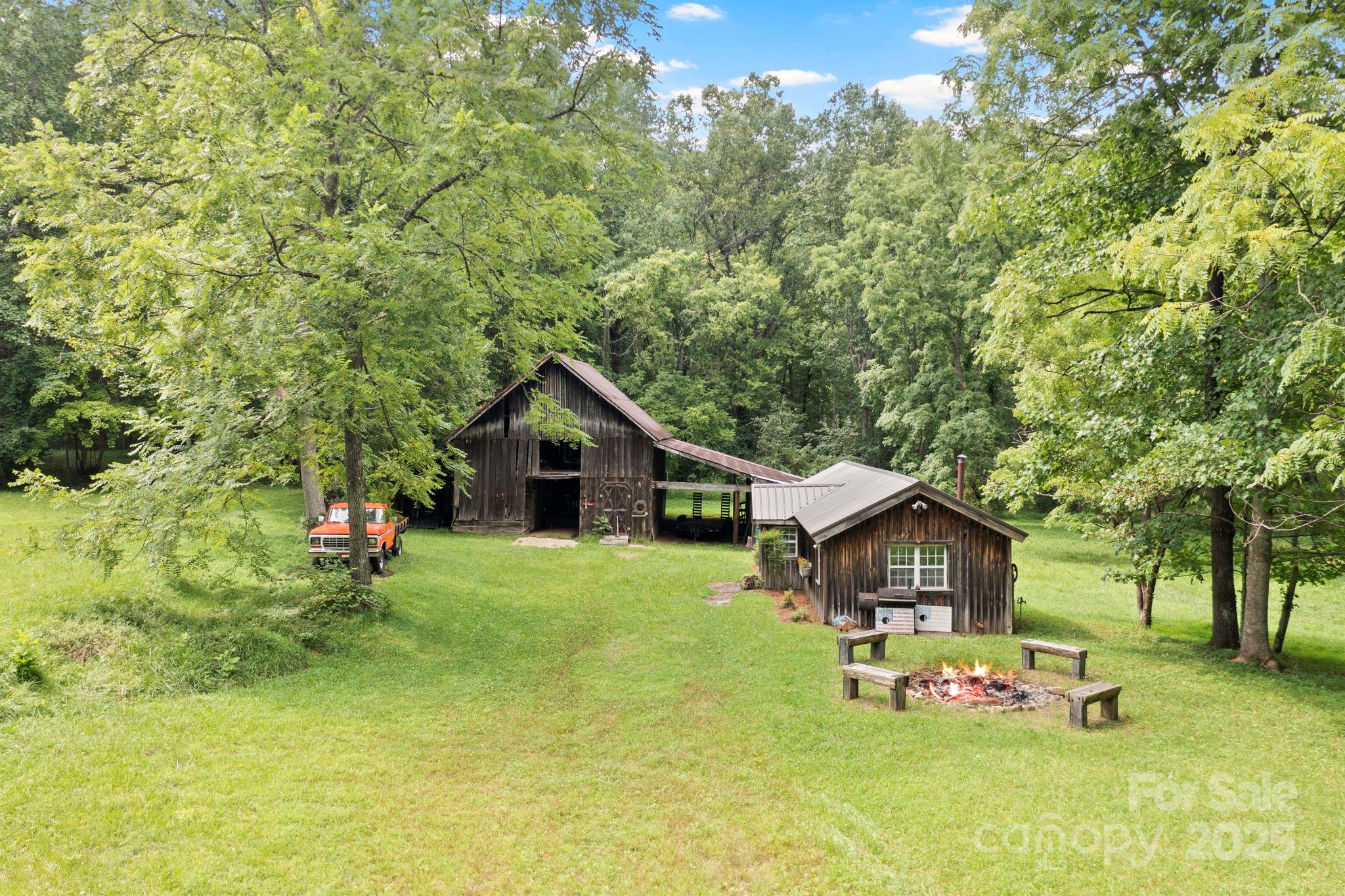 0 South Bobs Creek Road Zirconia, NC 28790 - Photo 14 of 31 a front view of a house with garden