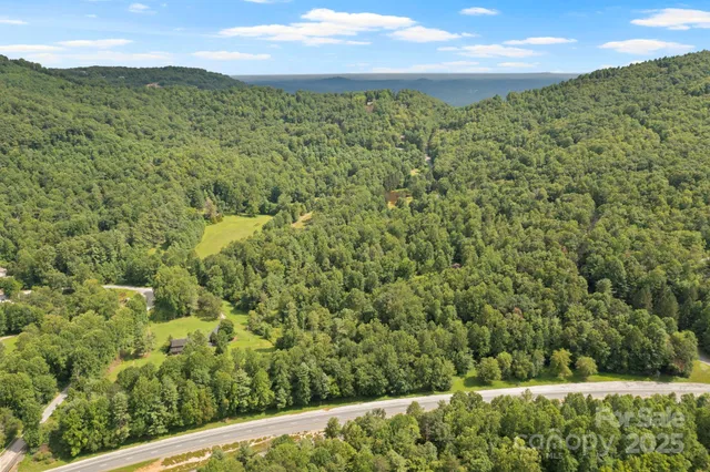 a view of a field with an outdoor space