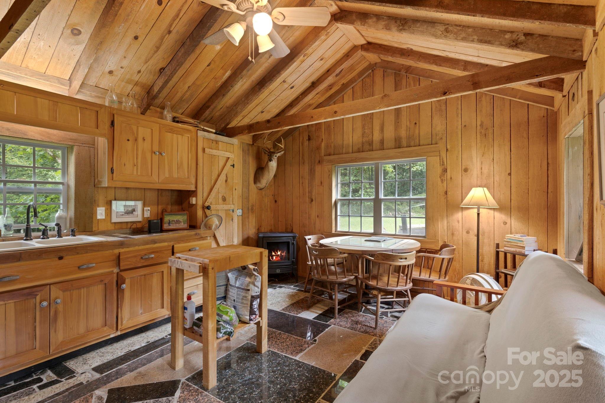 0 South Bobs Creek Road Zirconia, NC 28790 - Photo 8 of 31 a view of a kitchen with furniture and windows