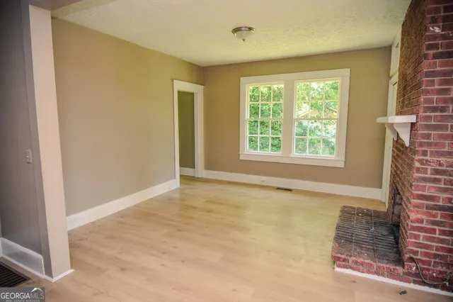 an empty room with windows