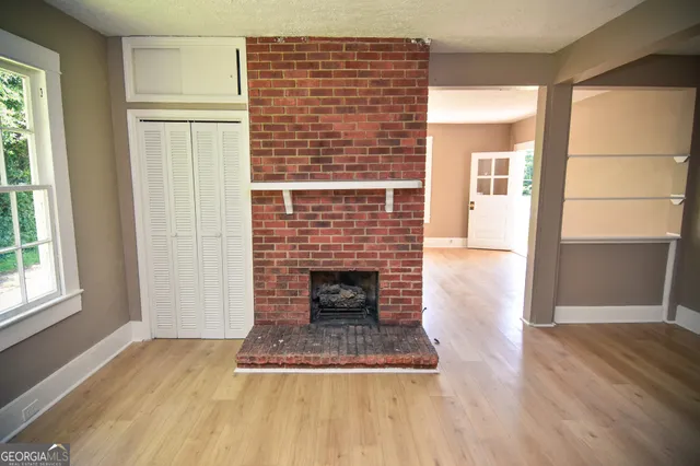 a living room with a fireplace
