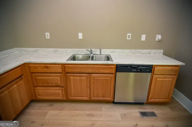 a utility room with washer and dryer