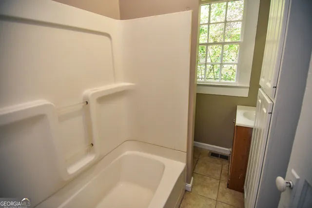 a bathroom with a bathtub