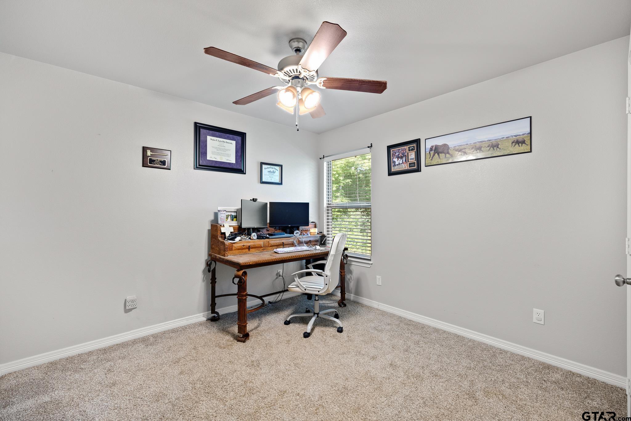 421 Alexander Street Kilgore, TX 75662 - Photo 16 of 24 a view of a workspace with a window