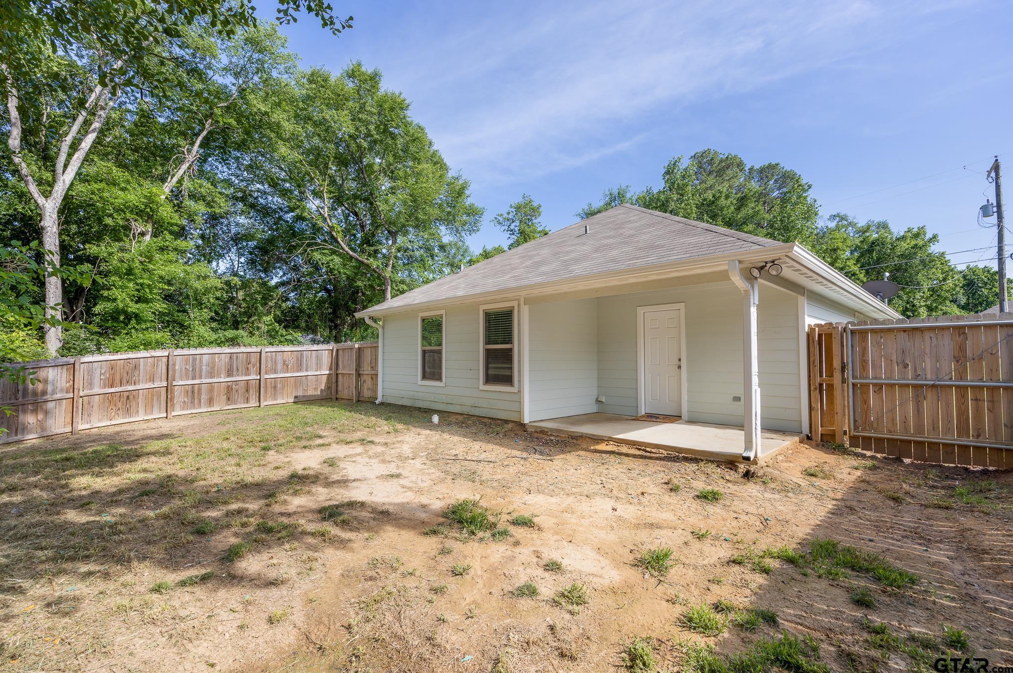 421 Alexander Street Kilgore, TX 75662 - Photo 24 of 24 a view of a house with a yard