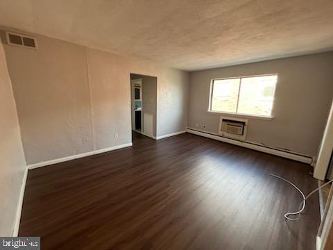 216 Boro Road, Unit A Secane, PA 19018 - Photo 2 of 26 an empty room with wooden floor and windows