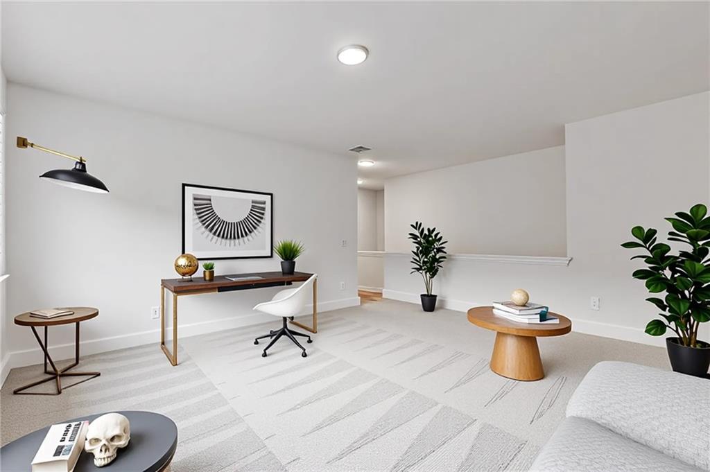 15 Overview Court Hoschton, GA 30548 - Photo 11 of 16 a living room with furniture