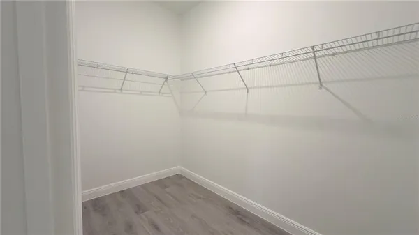 a white bath tub sitting in a bathroom