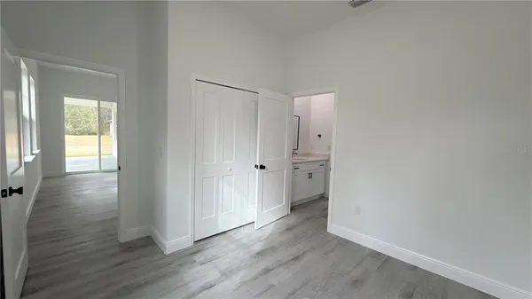 a view of house with outdoor space and shower