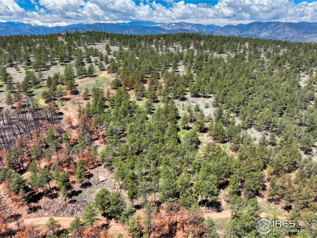 a view of a lake with sunset