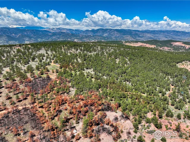 a view of a lake with sunset