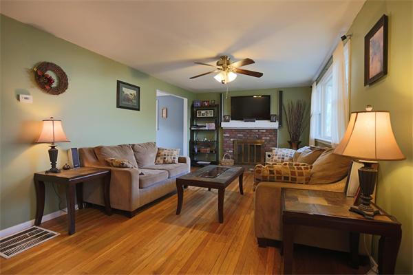 4 Arch Road Holbrook, MA 02343 - Photo 3 of 15 a living room with furniture and a wooden floor