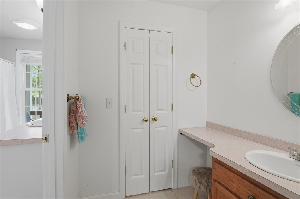 186 Common Street Groton, MA 01450 - Photo 15 of 28 a bathroom with a shower and a sink