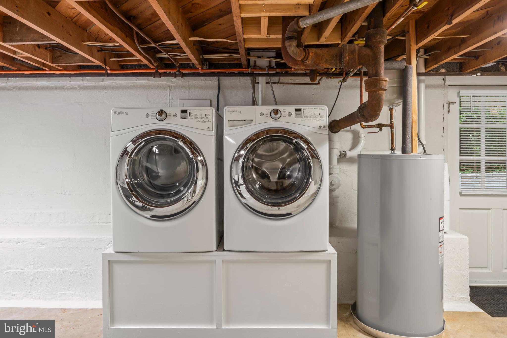 12131 Waples Mill Road Oakton, VA 22124 - Photo 23 of 40 a utility room with dryer and washer