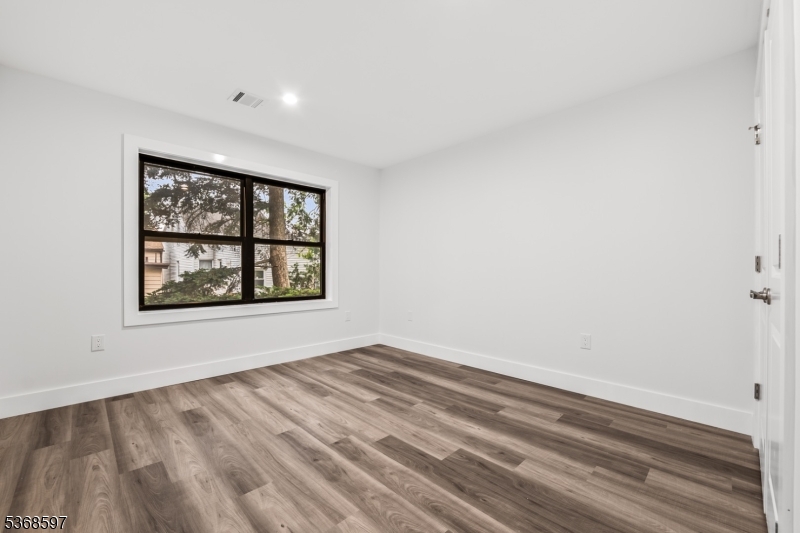 180 Carroll Street Paterson, NJ 07501 - Photo 24 of 31 a view of a window in a room