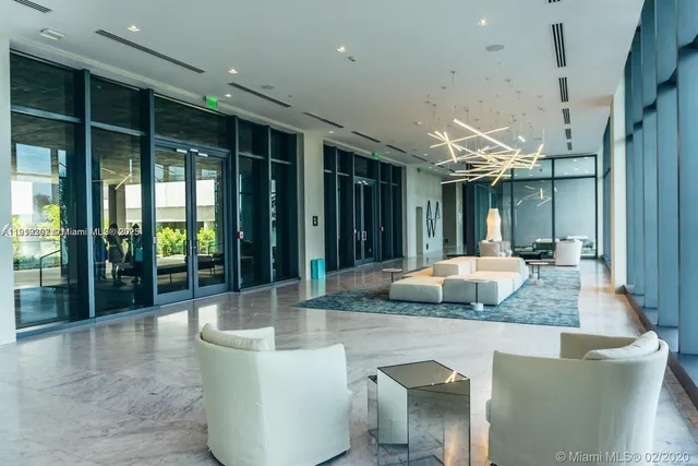 a swimming pool with tall buildings and city view