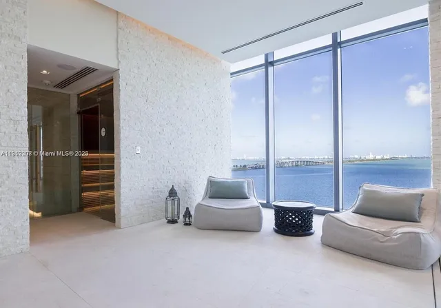 a living room with couch and a table