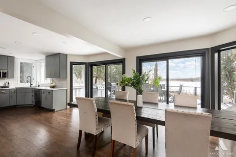 a view of a dining room with furniture and window