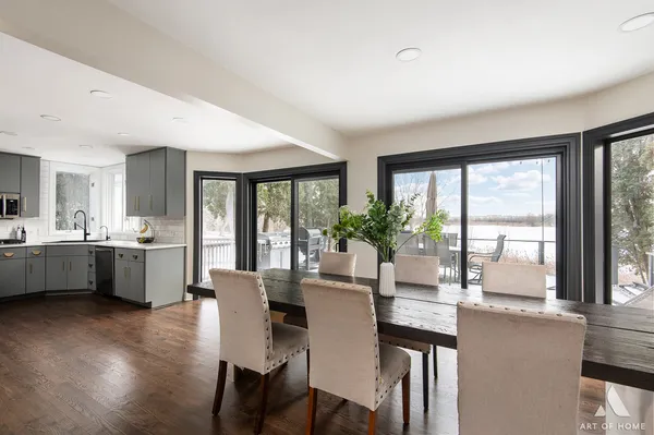 a view of a dining room with furniture and window