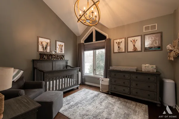 a view of a livingroom with furniture and hardwood floor