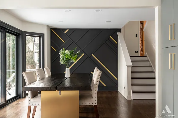 a living room with wooden floor furniture and a window