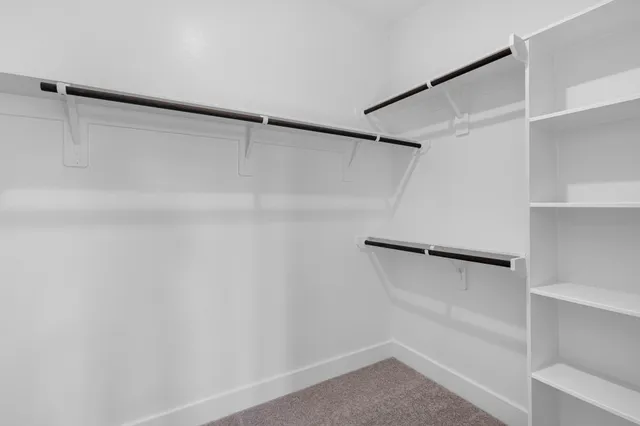 a bathroom with a sink double vanity and a mirror