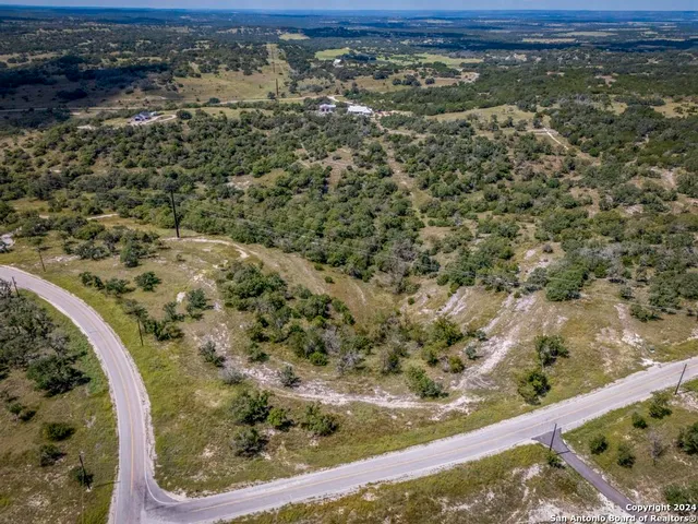 a view of a mountain from a yard