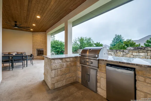a view of outdoor kitchen outdoor kitchen